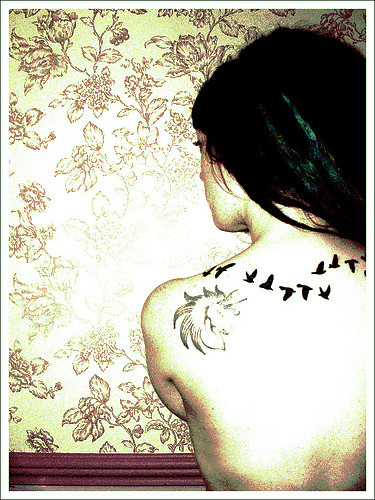 Flying Bird Silhouette Tattoo