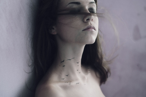 Flying Bird Silhouette Tattoo
