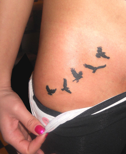 Flying Bird Silhouette Tattoo